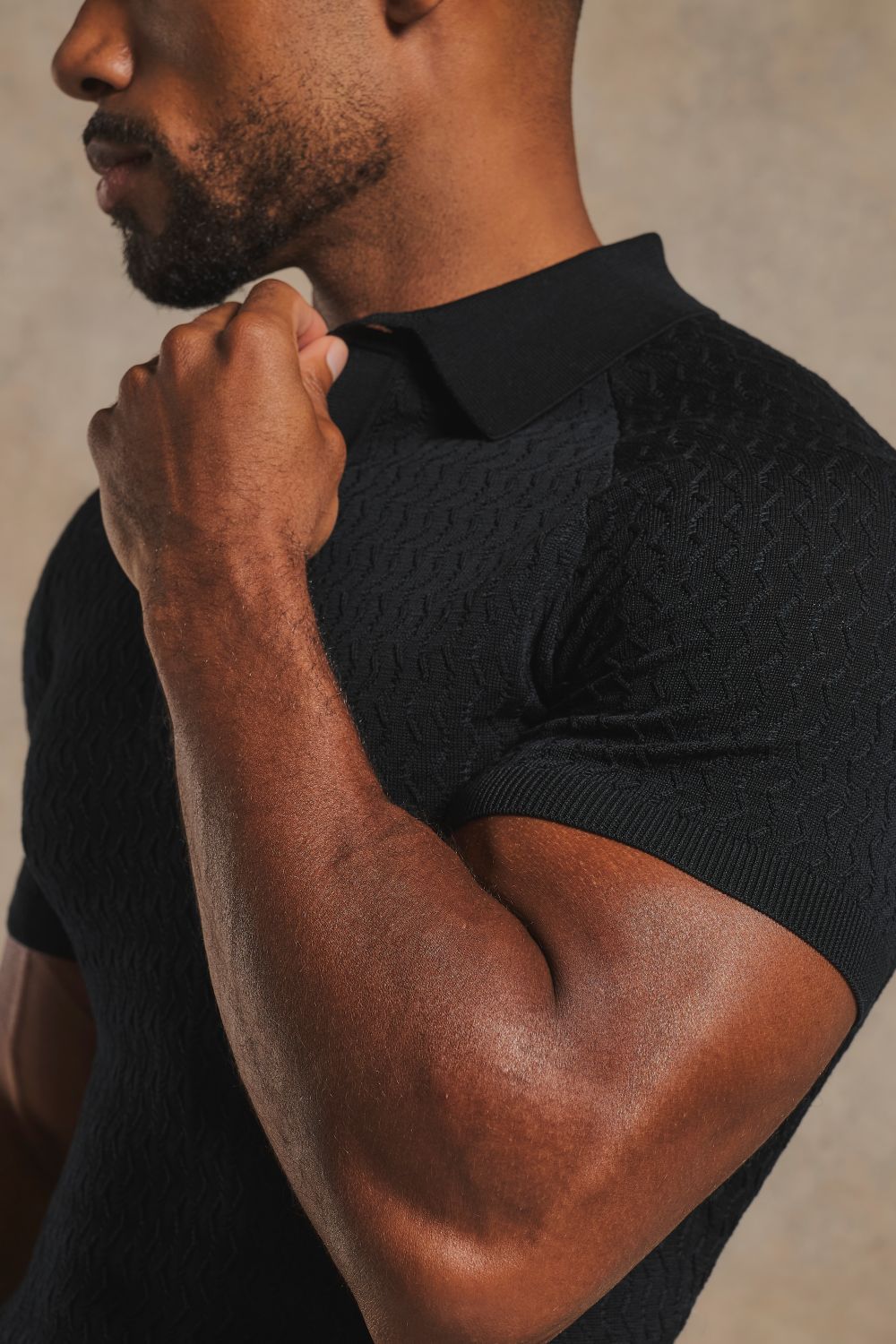 Mercerised Cotton Textured Knitted Polo Shirt in Black