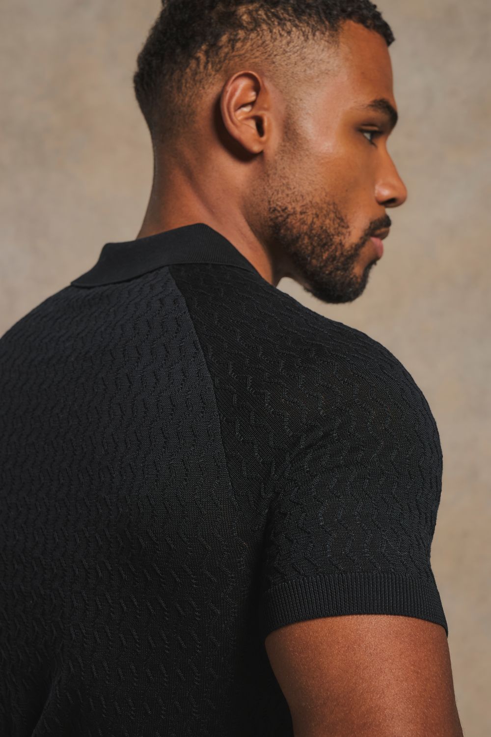 Mercerised Cotton Textured Knitted Polo Shirt in Black