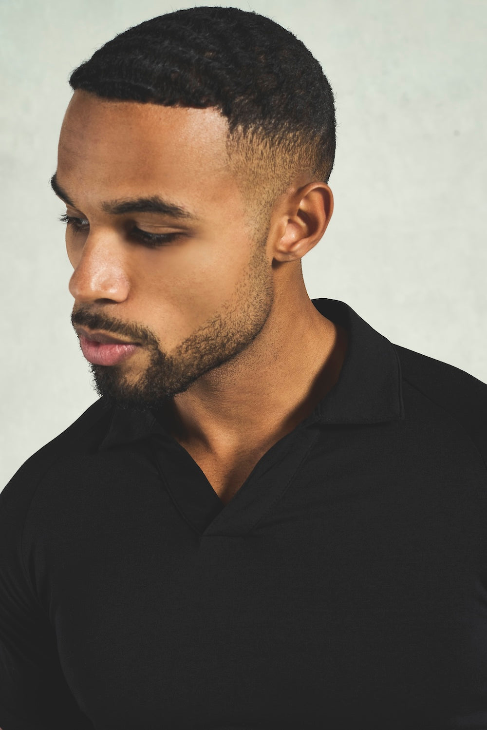 Essential Jersey Buttonless Polo Shirt in Black - TAILORED ATHLETE - USA