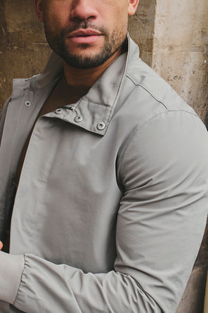 Shower Resistant Funnel Neck Jacket in Pebble Grey - TAILORED ATHLETE - USA