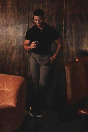 Knitted Half Zip Neck Polo in Black - TAILORED ATHLETE - USA