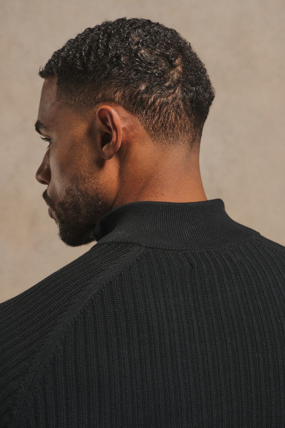 Textured Knitted Half Zip Neck Sweater in Black