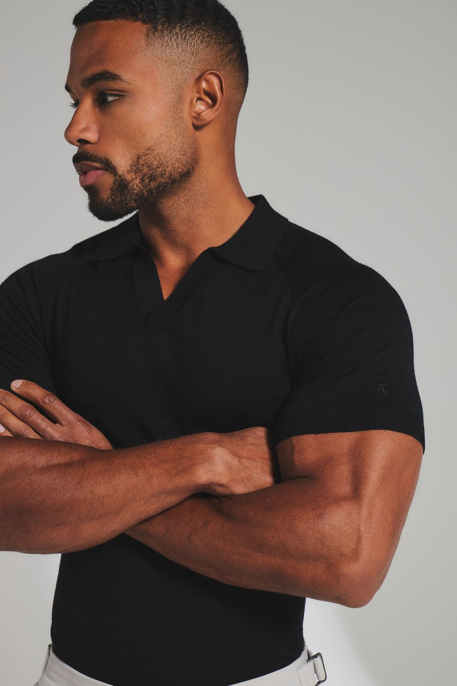 Extra Fine Merino Wool Knitted Open Collar Polo Shirt in Black