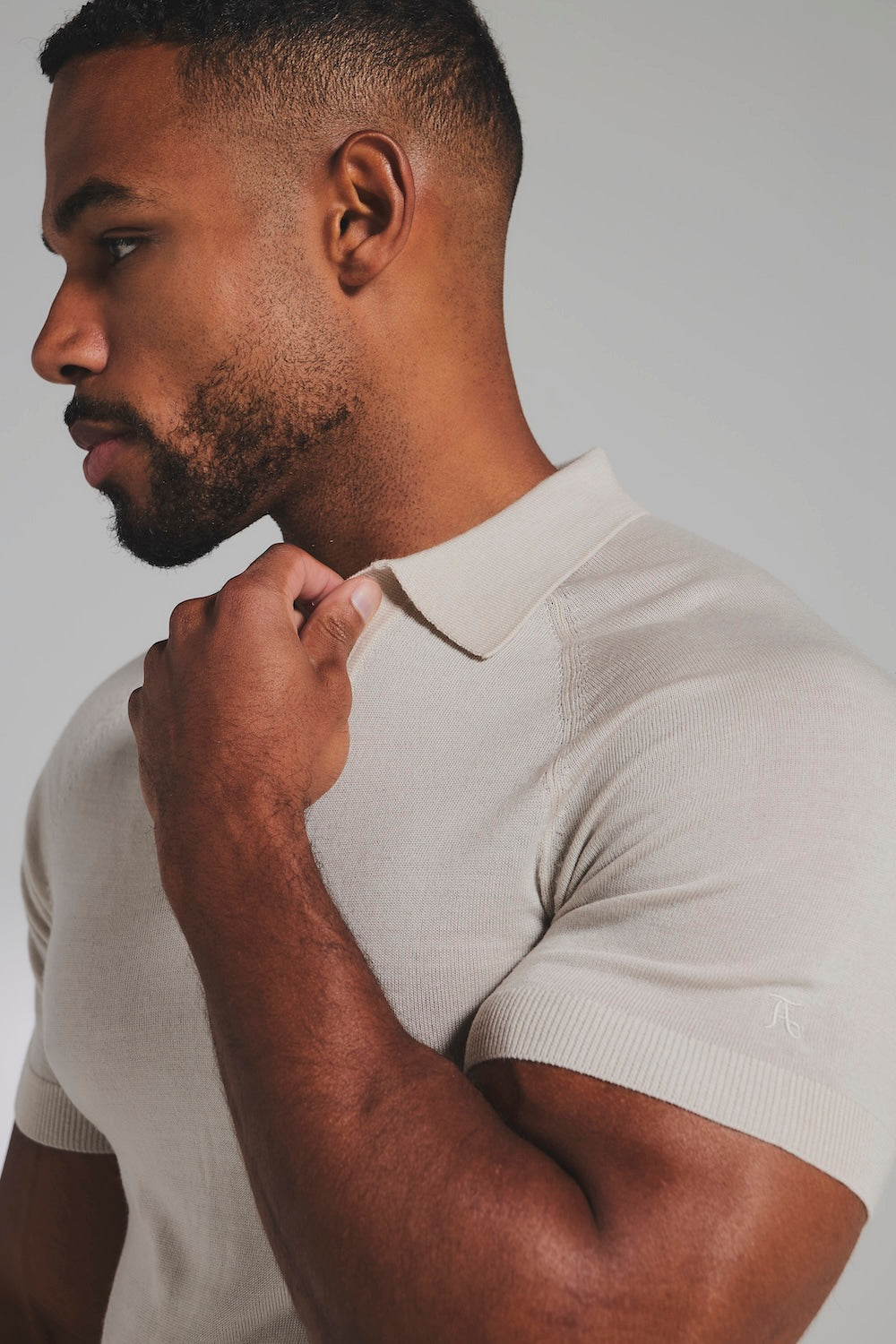 Extra Fine Merino Wool Knitted Open Collar Polo Shirt in Alabaster