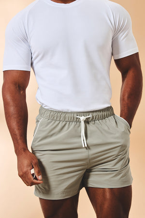 Quick Dry Piped Swim Shorts in Sage - TAILORED ATHLETE - USA