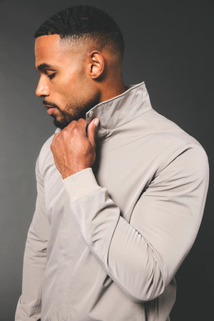 Shower Resistant Funnel Neck Jacket in Pebble Grey - TAILORED ATHLETE - USA