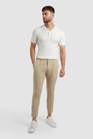 Cropped Pleated Trouser in Stone - TAILORED ATHLETE - USA