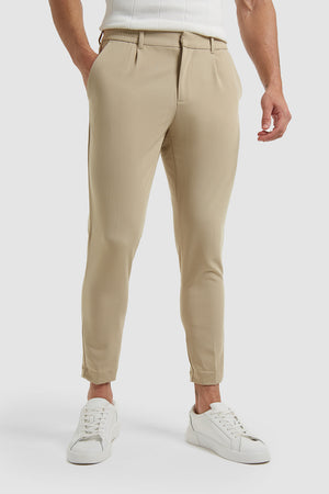 Cropped Pleated Trouser in Stone - TAILORED ATHLETE - USA