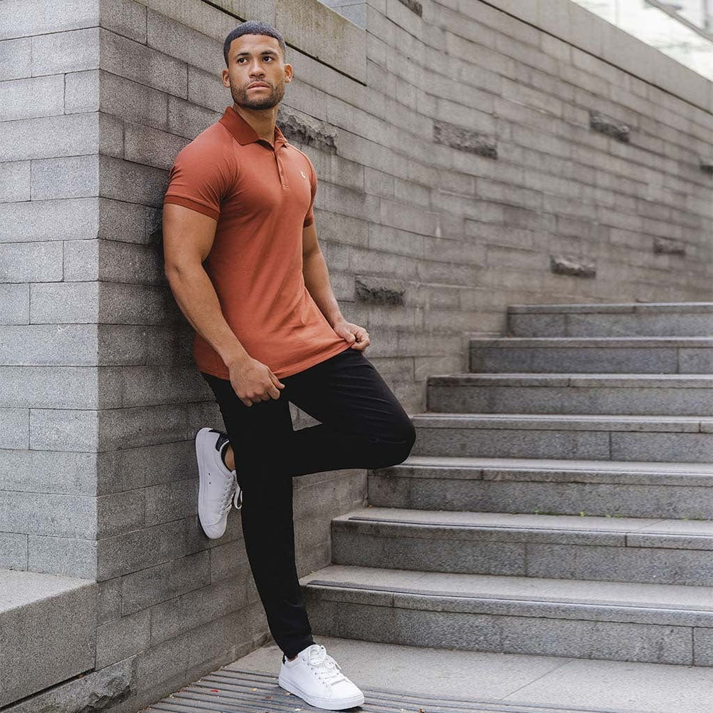Web design block featuring muscle-fit apparel and promotional content for a visually engaging layout