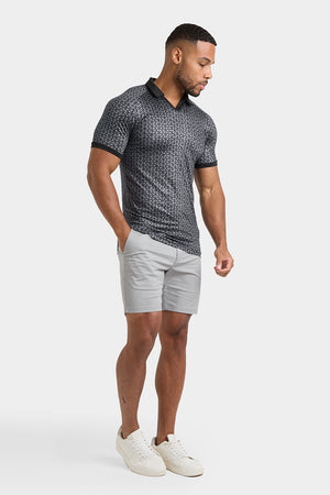 Printed Polo Shirt in Black Doodle Geo - TAILORED ATHLETE - USA