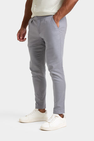 Linen Blend Cropped Pleated Pants in Mole - TAILORED ATHLETE - USA