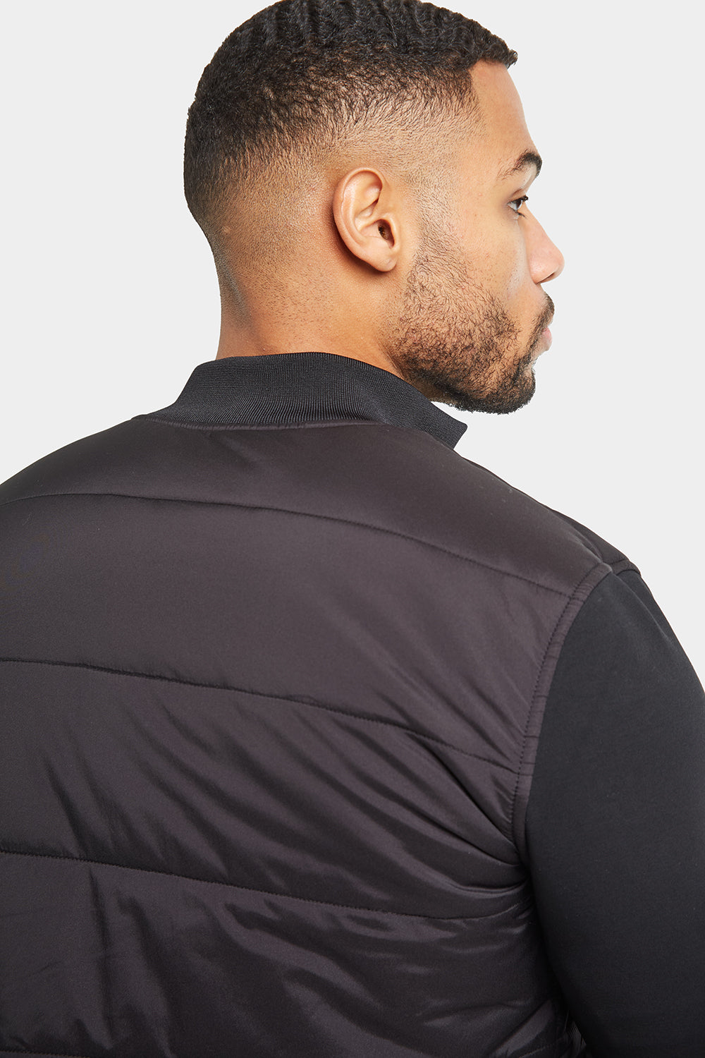 Quilted Hybrid Jacket in Black - TAILORED ATHLETE - USA